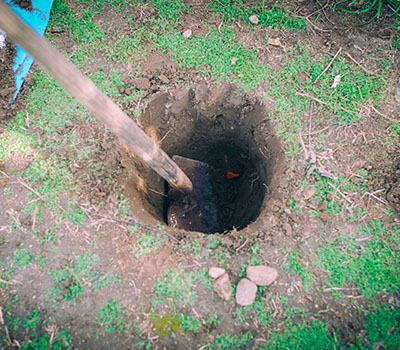 Image of a hole being dug with a shovel