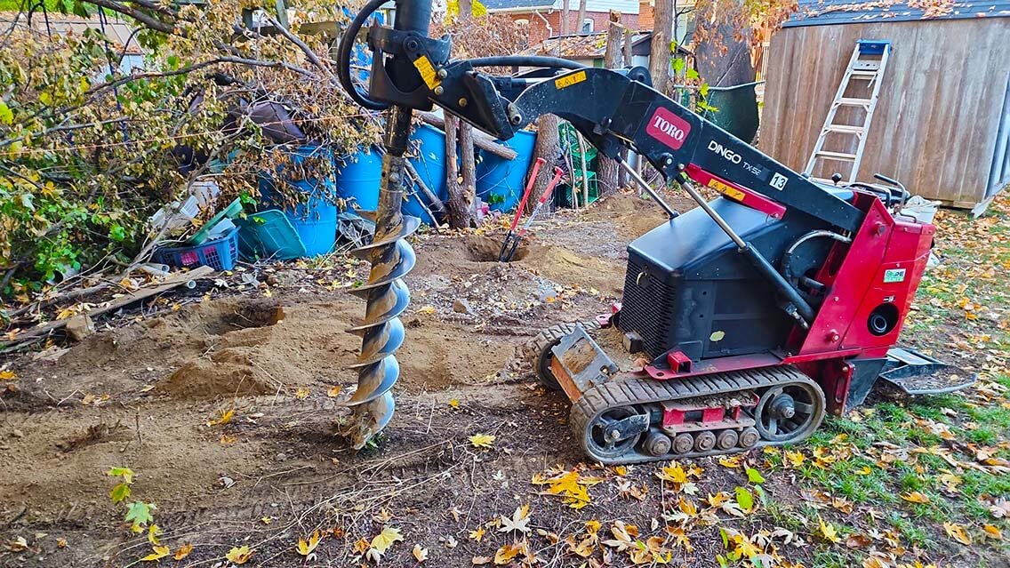 Image showing our machine digging a hole