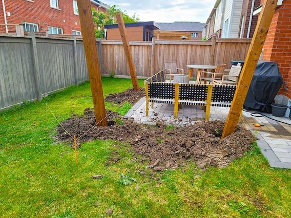 Image of gazebo footings and post installation