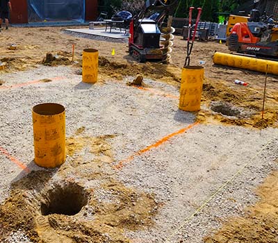 Images of deck footings installed by Post2Fence