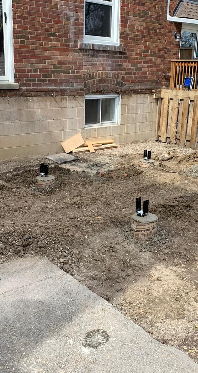 https://post2fence.com/wp-content/uploads/2026/04/deck-footing-installation-ontario-post2fence-640x1200.jpg