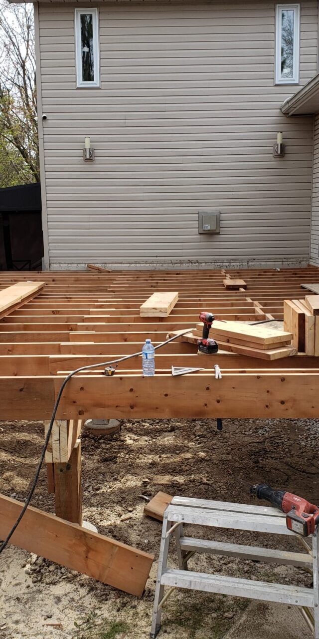 https://post2fence.com/wp-content/uploads/2026/04/deck-installation-ontario-post2fence-640x1280.jpg